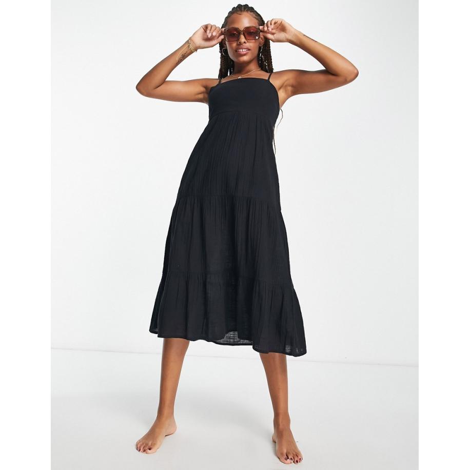 Iisla & Bird Maxi zomerjurk voor op het strand met stroken in zwart Zwart