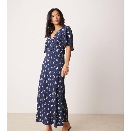 Nobody's Child Petite Faith Nette midi-jurk met strik in marineblauw met madeliefjesprint