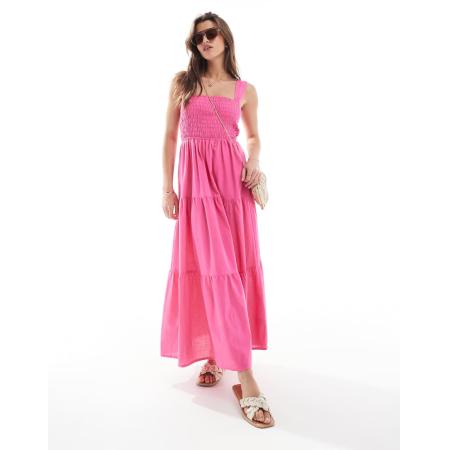Esmee Exclusive Maxi strandjurk met gesmokt lijfje in roze