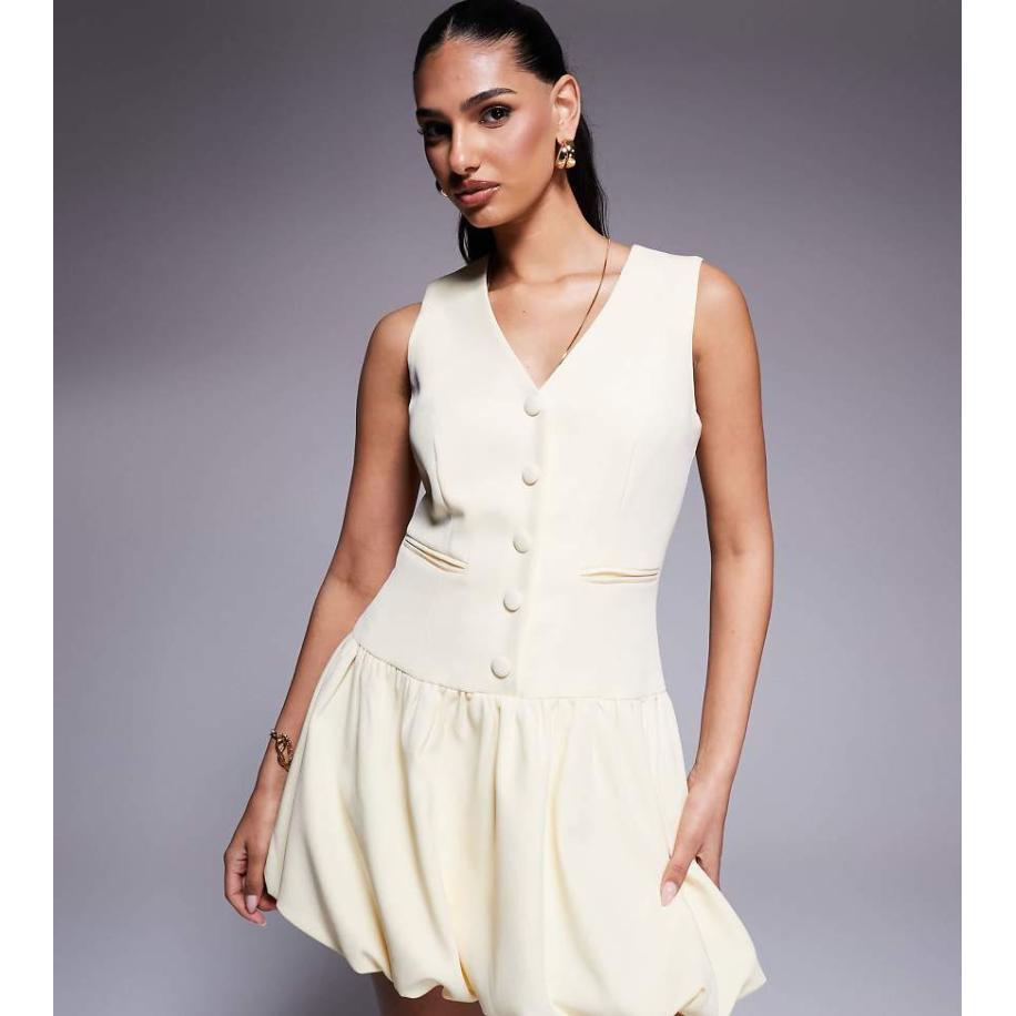 Kaiia Exclusives Elegante mouwloze mini jurk met knopen en pofrok in geel Geel