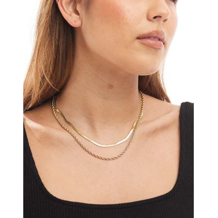 ASOS DESIGN Set van 2 kettingen met gedraaide schakelketting en platte ketting van waterdicht roestvrij staal in goudkleur