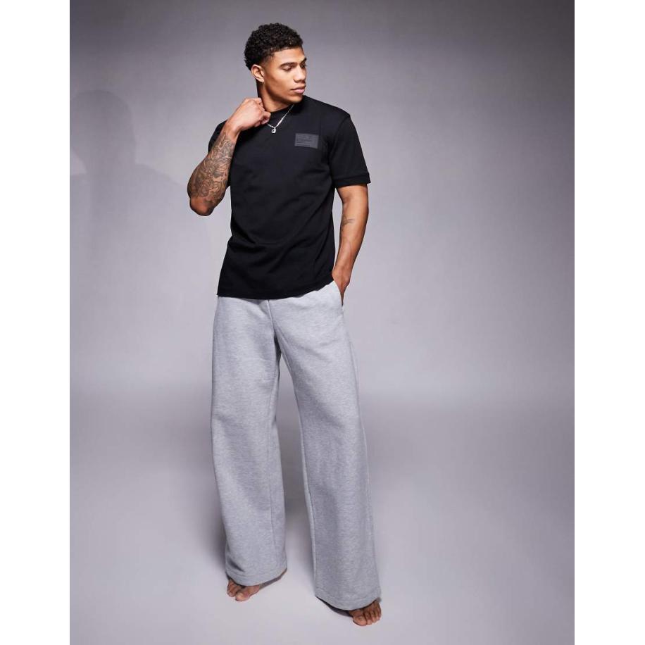 Armani - EA7 - Oversized T-shirt met logopatch in zwart Zwart