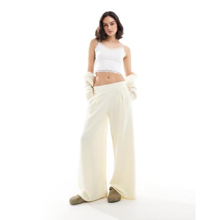 Bershka Joggingbroek met wijde pijpen in botergeel