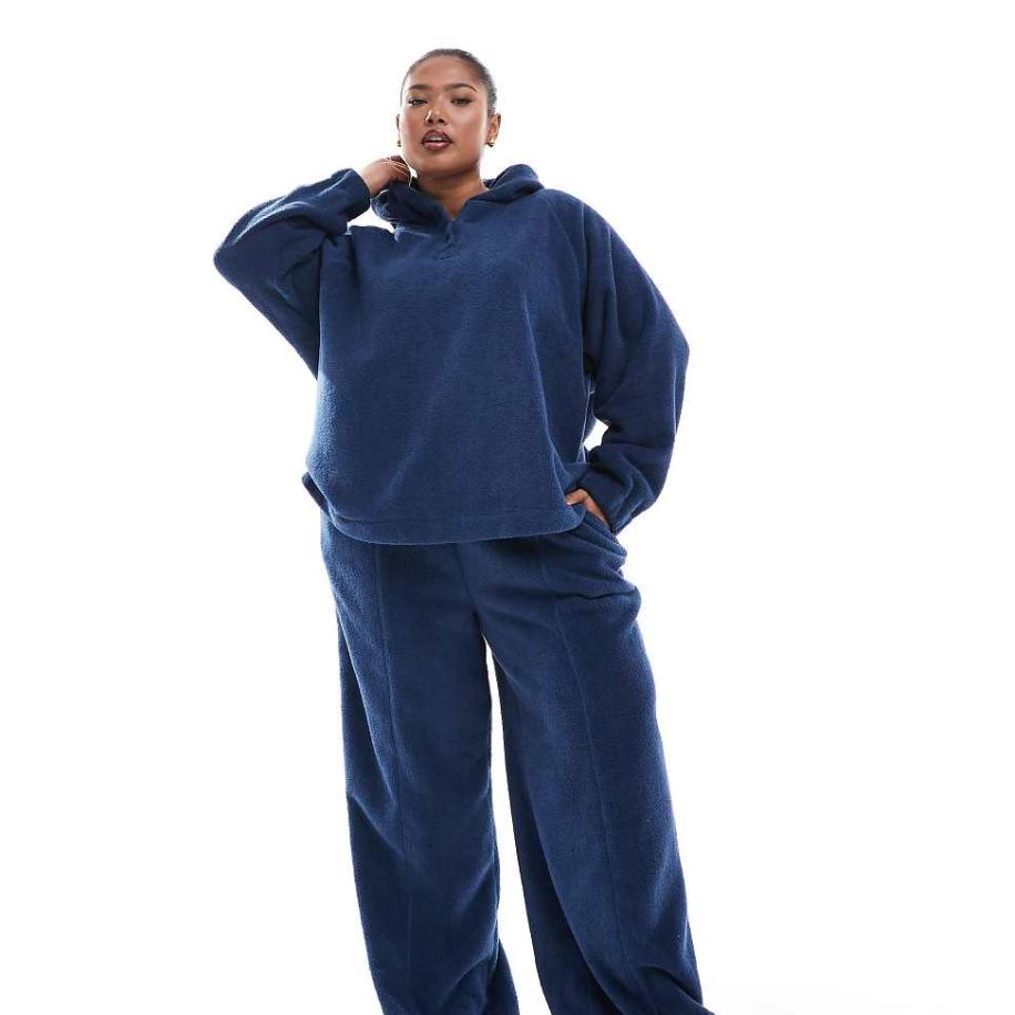 ASOS DESIGN Curve Loungebroek van microfleece met wijde pijpen in donkerblauw Blauw