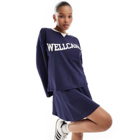 Pieces Wellness Mini rok van jersey met A-lijn en 'Wellcare'-print in marineblauw, deel van co-ord set