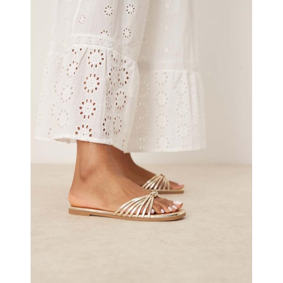 RAID Bella Platte sandalen met geknoopte bandjes in goud Goud