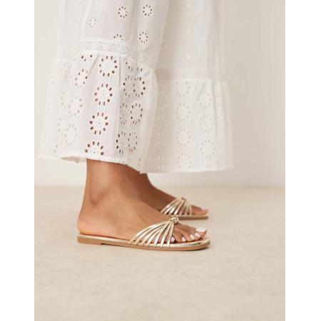 RAID Bella Platte sandalen met geknoopte bandjes in goud