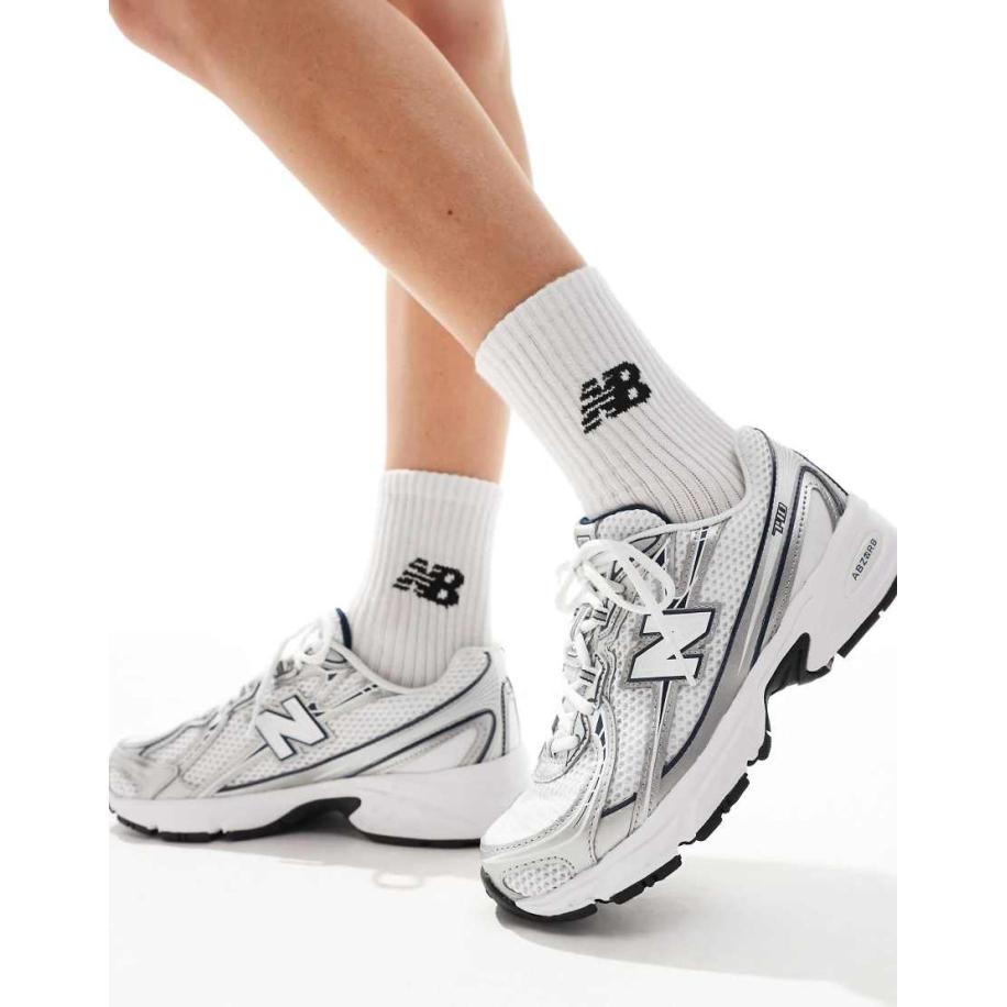 New Balance 740 - Sneakers in marineblauw en wit Blauw