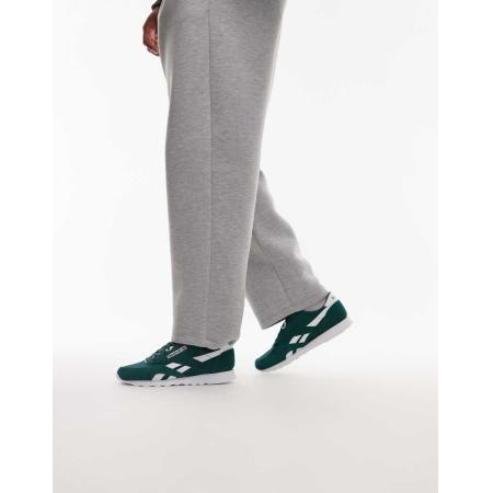 Reebok - Classic - Nylon sneakers in donkergroen