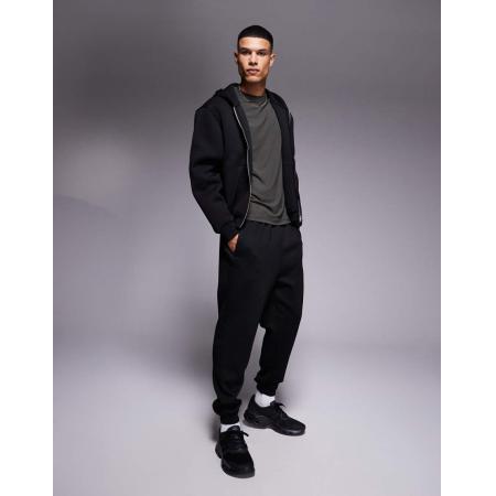 4505 - Icon - Toelopende sneldrogende performance-joggingbroek in zwart