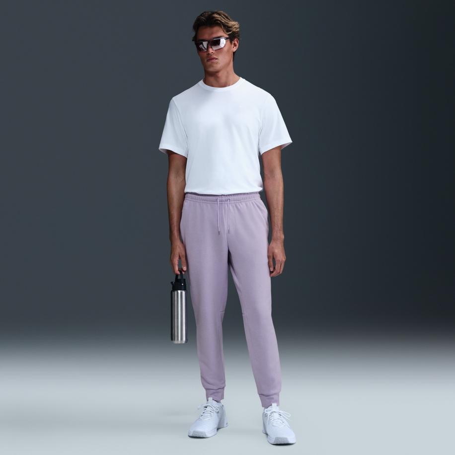 Nike Primary Fleece Dri-FIT UV performance joggingbroek voor heren - Paars Paars