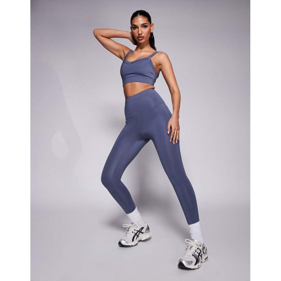 4505 Hardlooplegging met hoge taille en telefoonzakje met rits in blauw Blauw