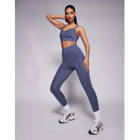 4505 Hardlooplegging met hoge taille en telefoonzakje met rits in blauw