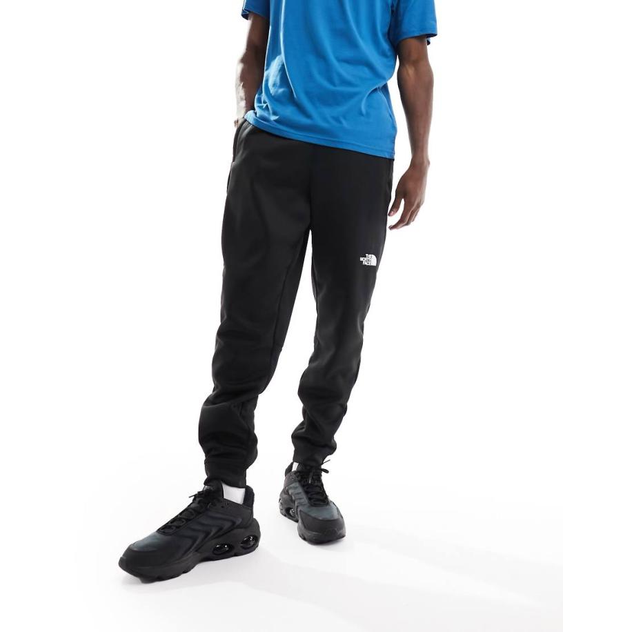 The North Face - Training Reaxion - Fleece joggingbroek in zwart Zwart