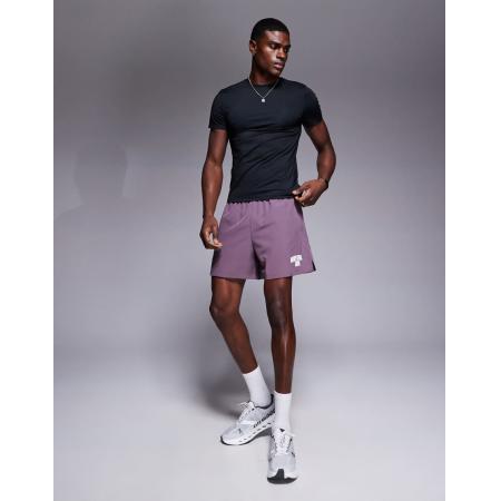 4505 - Tainingsshort van 18 cm met wijde pijpen, grafische print en ritszakken van sneldrogend badstof in paars