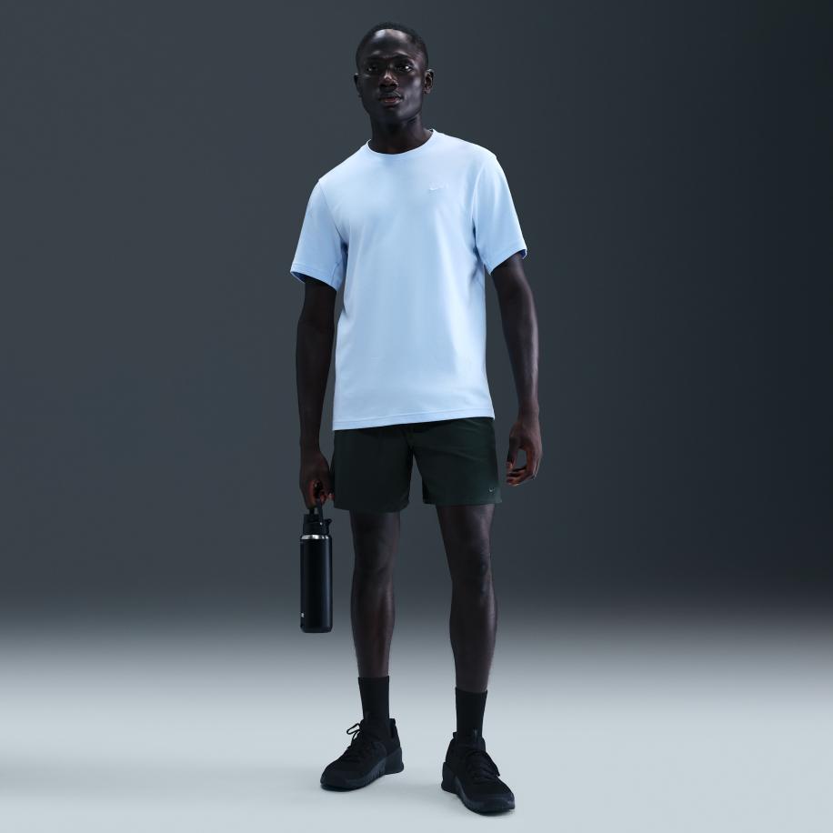 Nike Unlimited multifunctionele niet-gevoerde herenshorts met Dri-FIT (18 cm) - Groen Groen