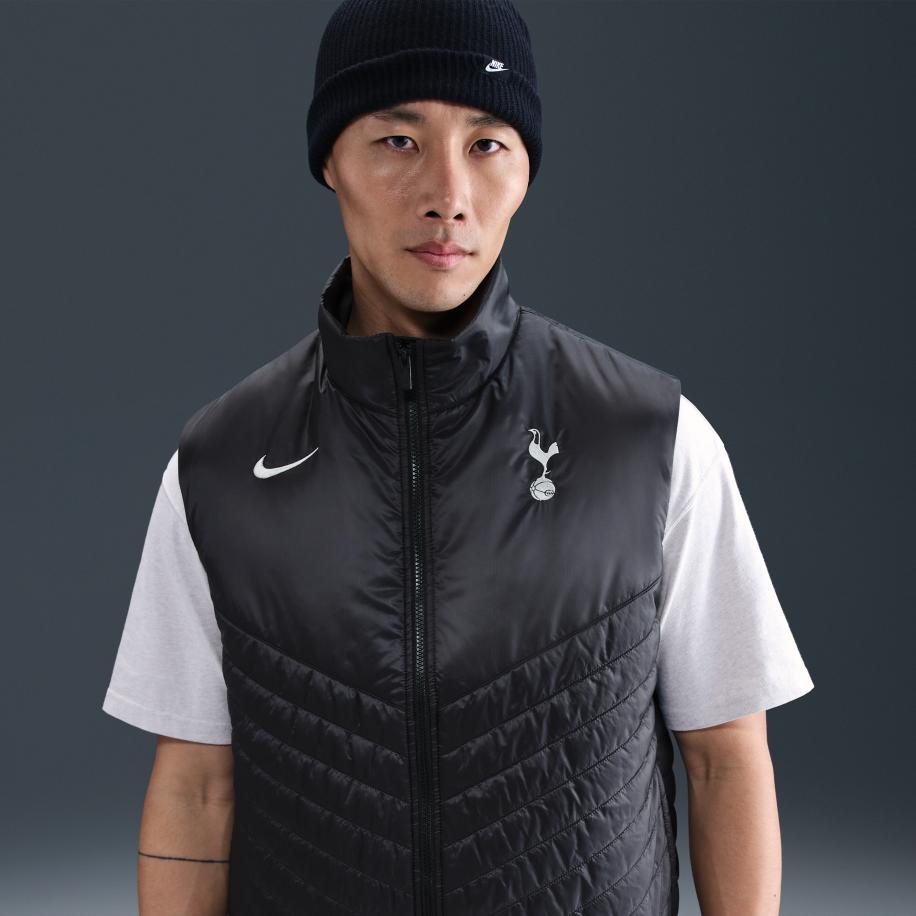 Tottenham Hotspur Windrunner Nike Therma-FIT middelzware, gewatteerde voetbalbodywarmer voor heren - Zwart Zwart