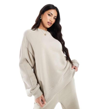 The Couture Club Essentials Oversized sweater met ronde hals en wassing in beige-Neutraal
