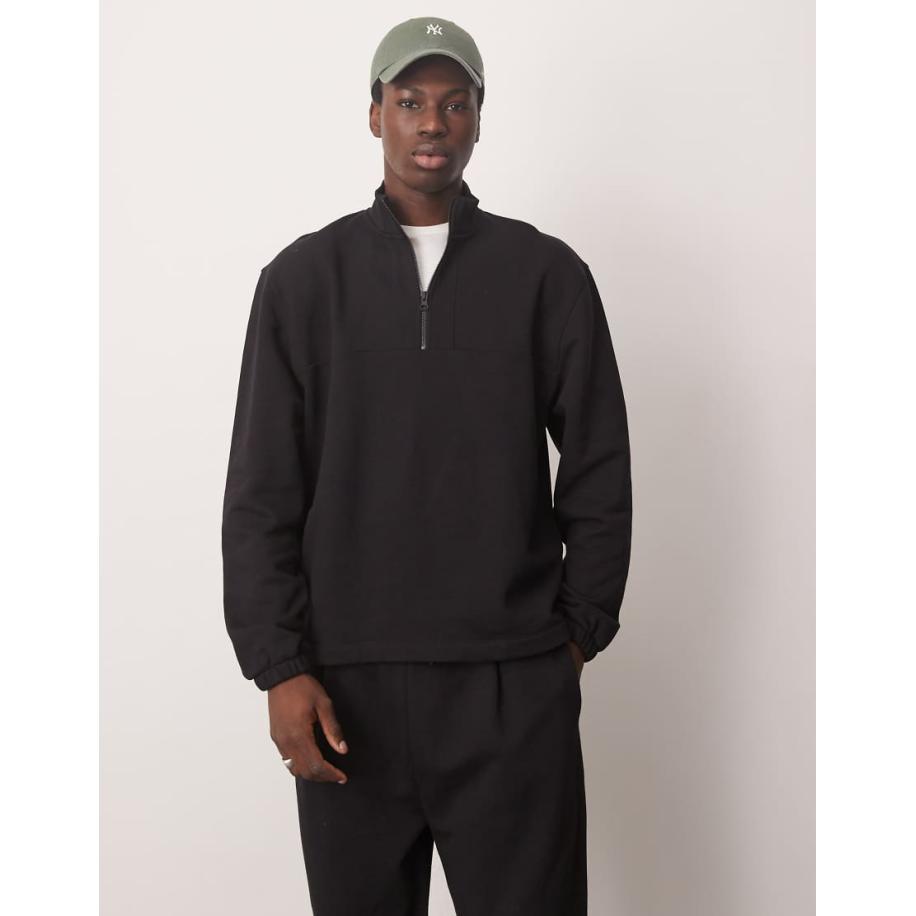 ASOS DESIGN - Oversized sweatshirt van zware stof met kwartrits in zwart, deel van co-ord set Zwart