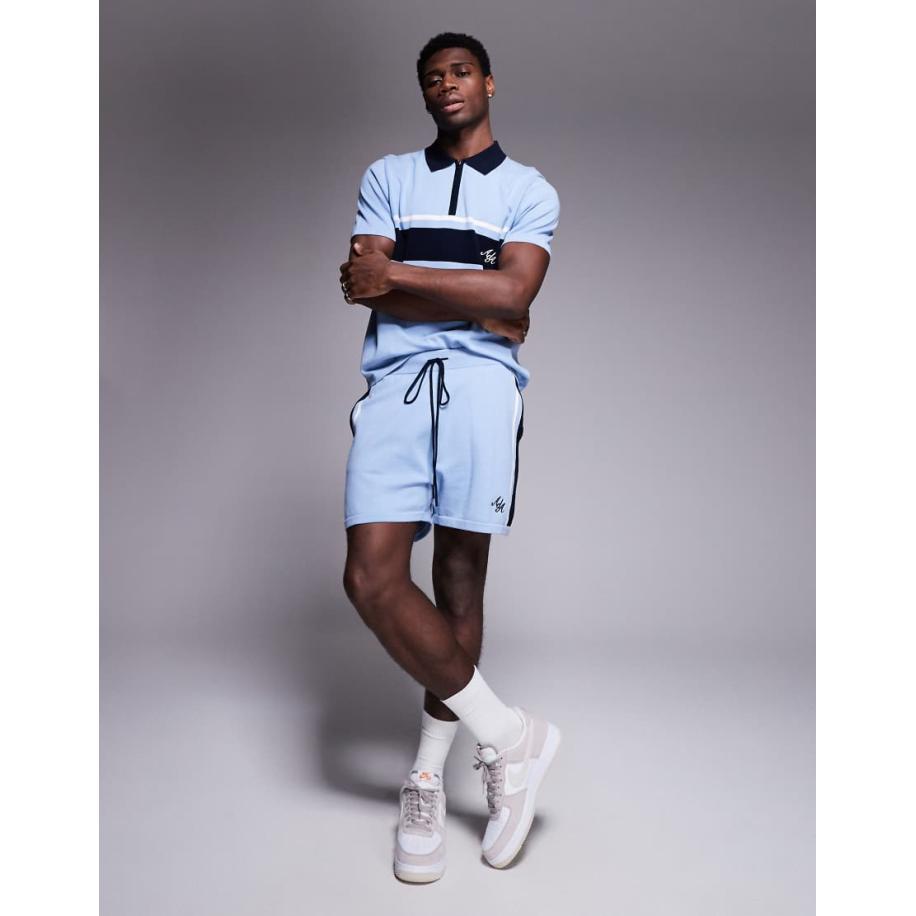 Alma de Ace - Gebreid poloshirt in blauw, deel van co-ord set Blauw