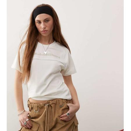 COLLUSION Sportieve aansluitende top met biezen in ecru-Neutraal