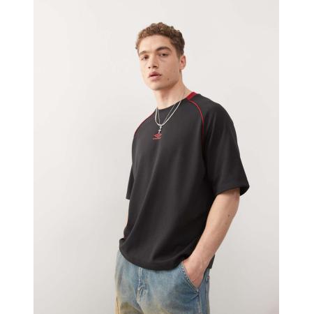 Umbro - T-shirt van mesh met inzetstukken in zwart