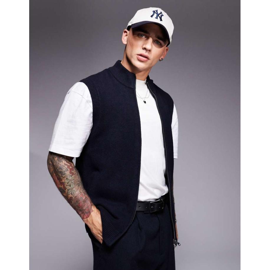 ASOS DESIGN - Gebreide bodywarmer met opstaande boord en rits in marineblauw Blauw