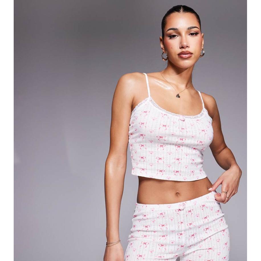 Kaiia Exclusive Ajourgebreid pyjamatopje met roosje in wit met strikjesprint, deel van co-ord set-Veelkleurig Multicolor