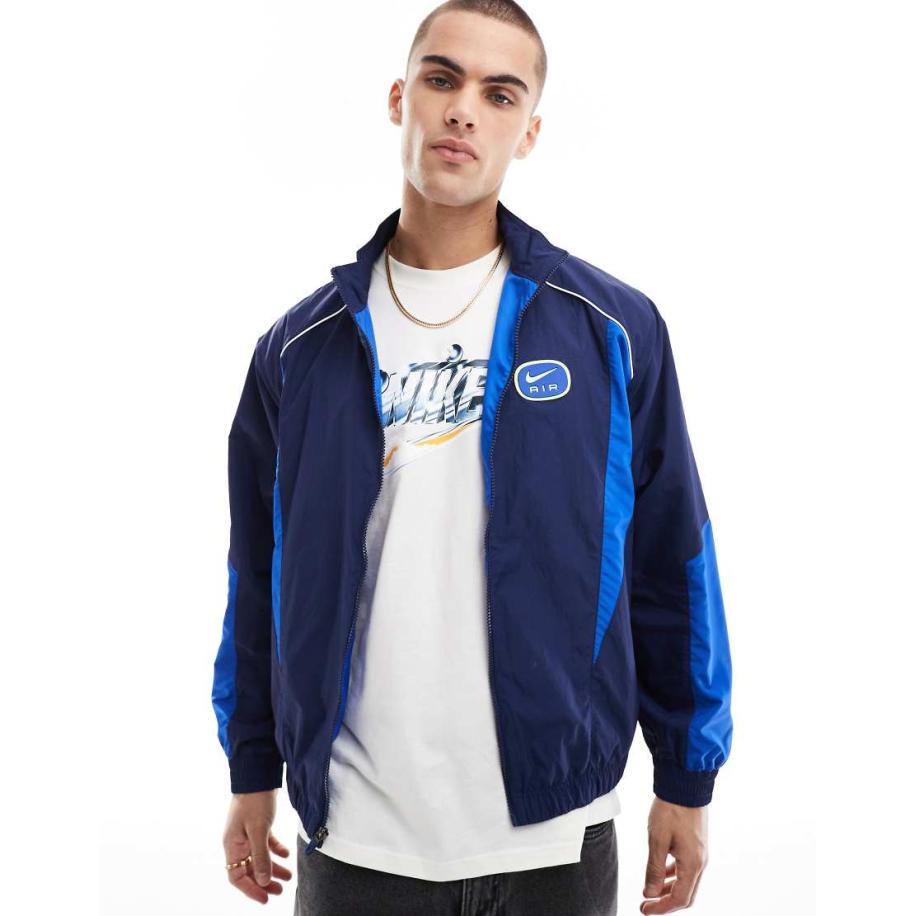 Nike - Air - Geweven trainingstop met swoosh in marineblauw en blauw Blauw
