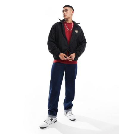 Tommy Jeans - Omkeerbaar jack van teddy stof met logo in zwart