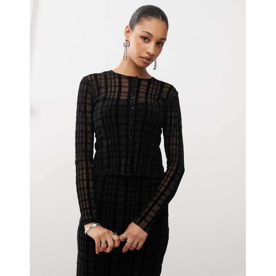 Motel Kahula Micro-vestje met geflockte ruitjes in zwart Zwart