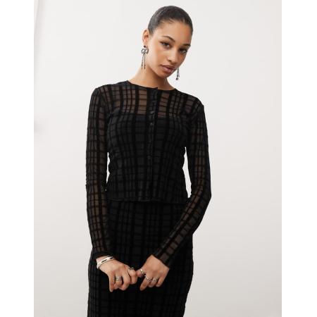 Motel Kahula Micro-vestje met geflockte ruitjes in zwart