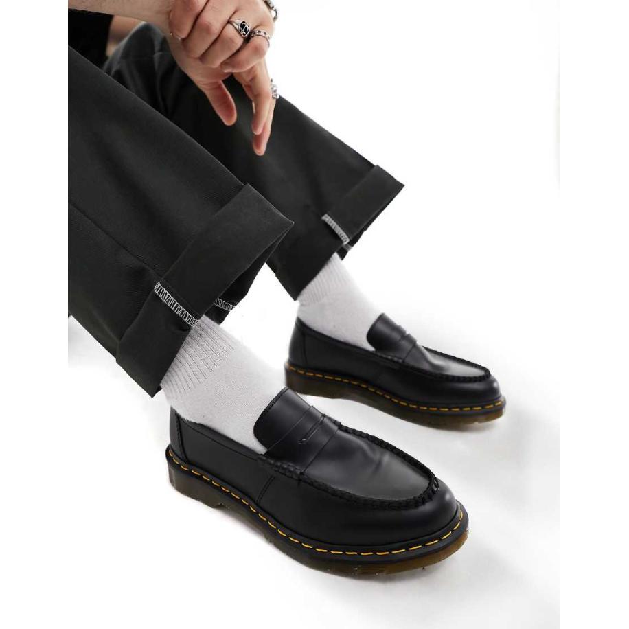 Dr Martens - Penton - Gladde uniseks loafers in zwart Zwart