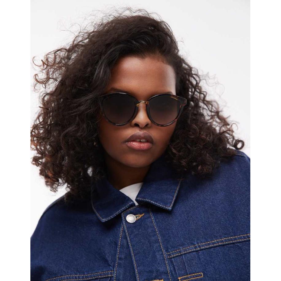 Le Specs Influx Ronde zonnebril met gouden detail in tortoise Goud